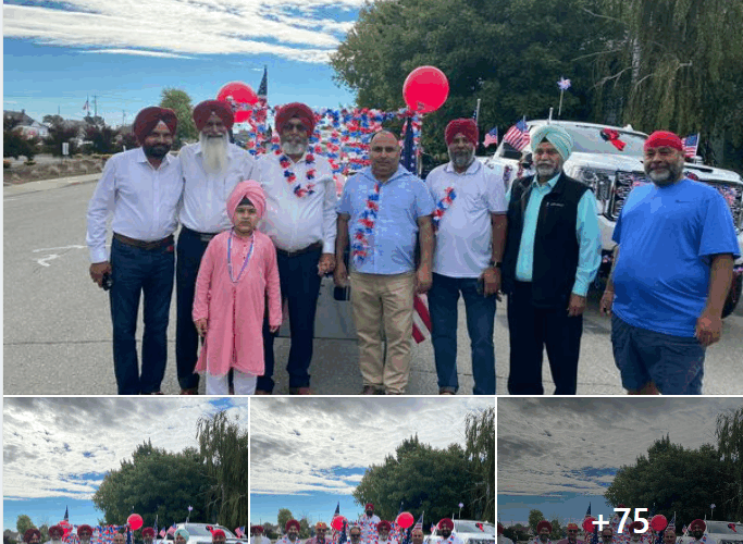 Group photo with people and balloons outdoors.